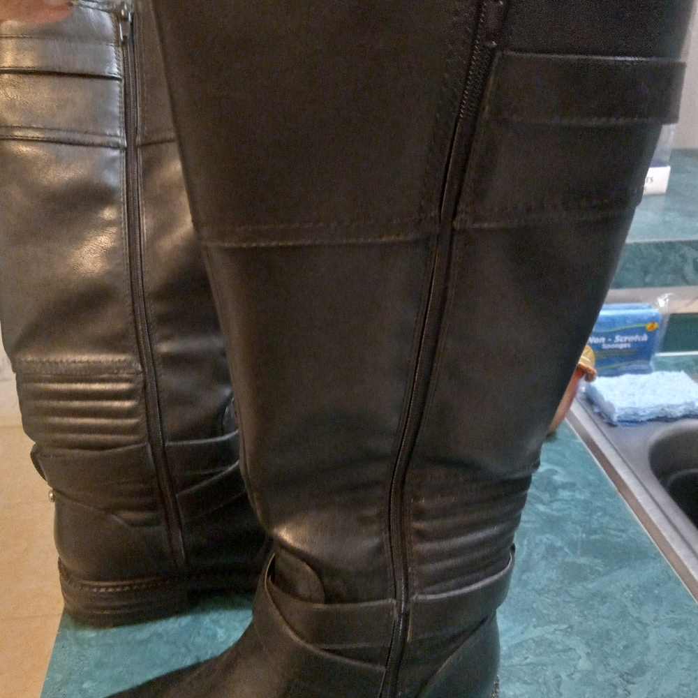 Black woman's tall boots